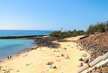 Tourists on a beach in the Canary Islands